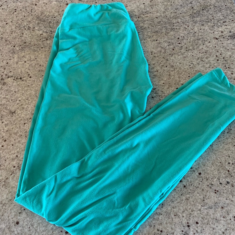 New, never worn Lularoe leggings. Light teal color